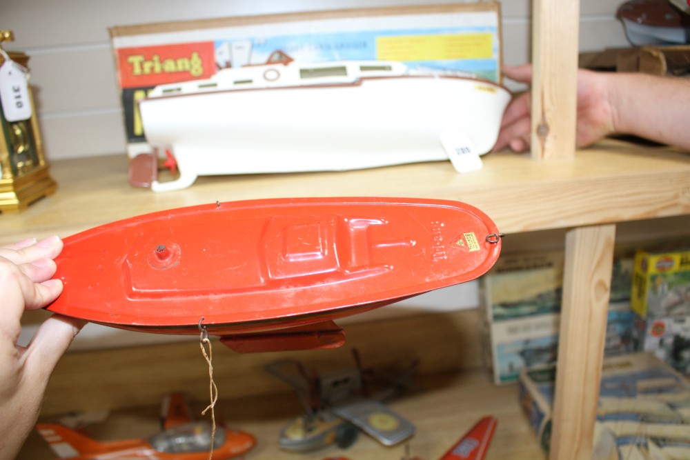 A Tri-ang Avon 17 inch electric motor luxury cabin cruiser model, boxed, together with a Tri-ang enamelled metal model of a yacht, 26.5